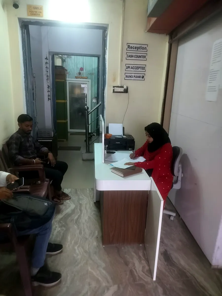 Clinic reception desk and patient waiting area